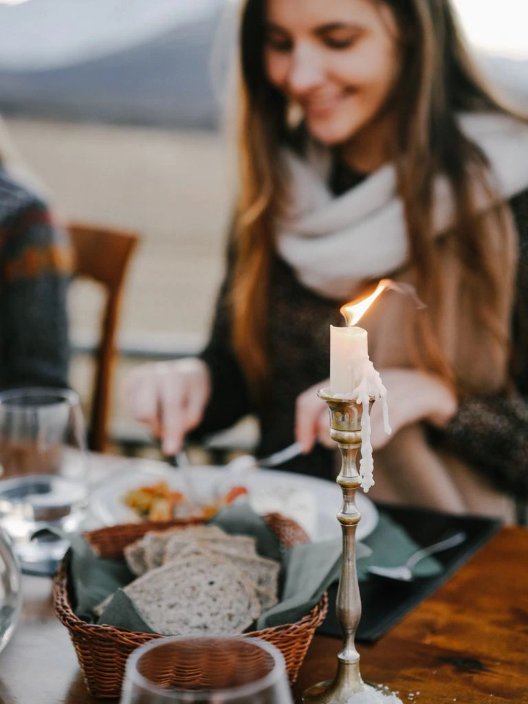 Candlelit terrace overlooking the Mediterranean at dusk